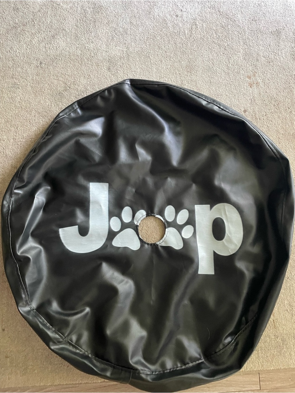 New Jeep Black Spare Tire Cover with White Paw Print Logo with camera hole.